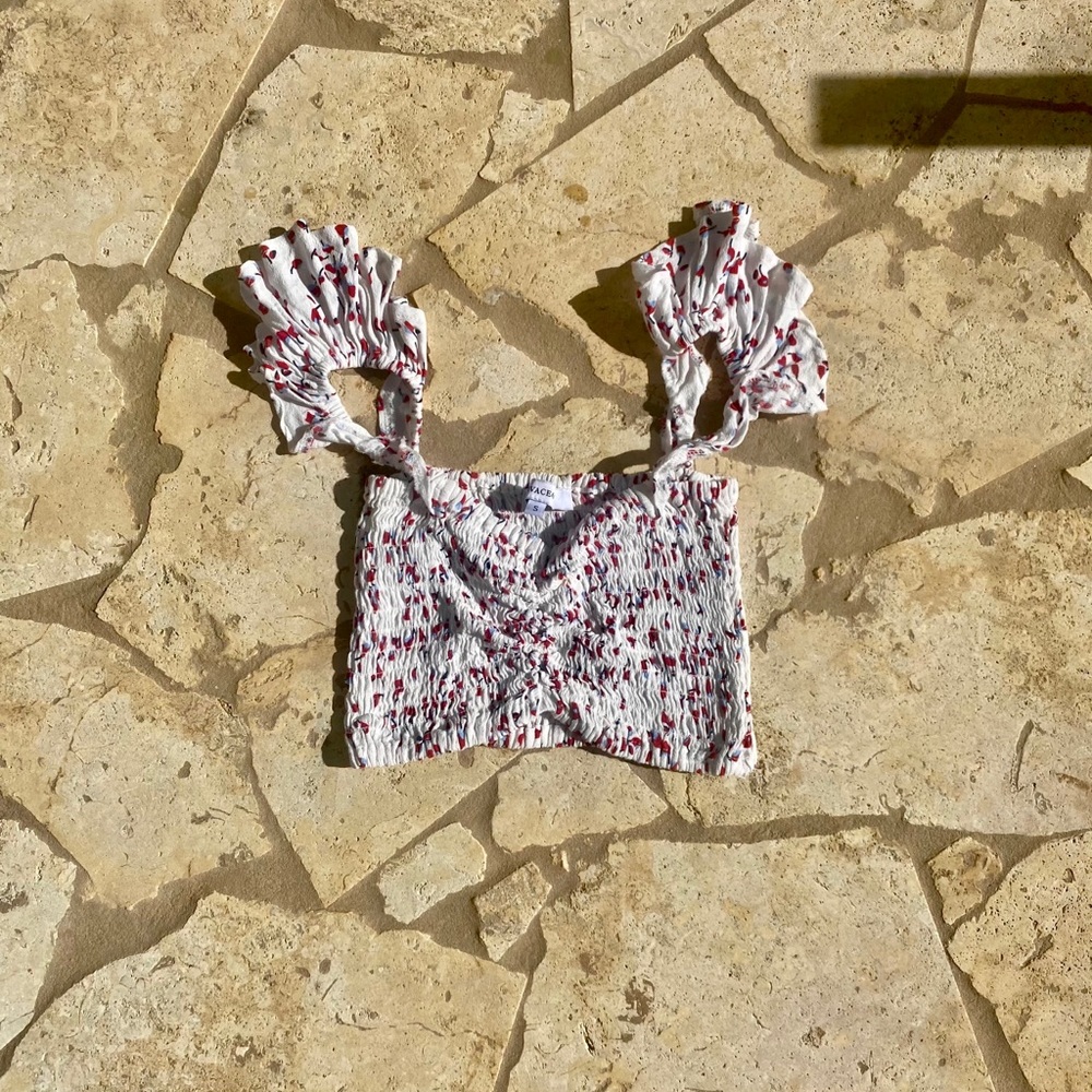 Olivaceous top.